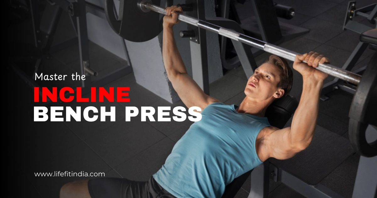 Man performing incline bench press exercise to build upper chest strength at LIFE FIT gym